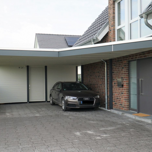 Doppelcarport mit Haustürvordach in Langenberg