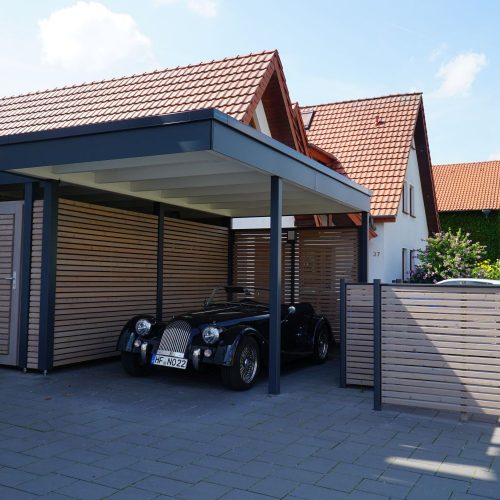 Carport mit Abstellraum und Mülltonnenunterstand in Schloß- Holte