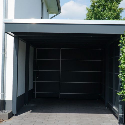 Flachdachcarport mit Abstellraum und HPL Platten in Oelde