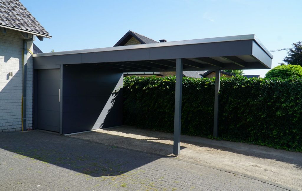 Carport mit HPL Platten und Abstellraum in Oelde Pollmeier Holzbau GmbH Carport mit HPL Platten und Abstellraum in Oelde Pollmeier Holzbau GmbH