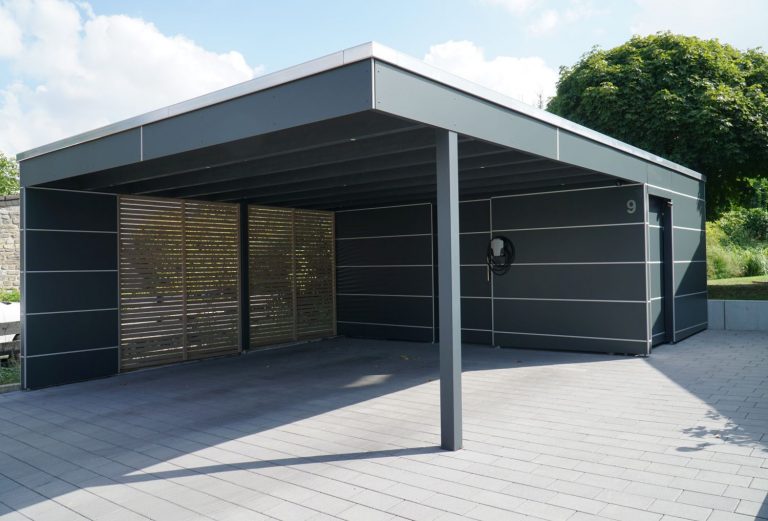 Carport mit HPL Platten und Abstellraum in Verl Pollmeier Holzbau GmbH Carport mit HPL Platten und Abstellraum in Verl Pollmeier Holzbau GmbH